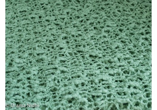 Poncho vert lichen crocheté 